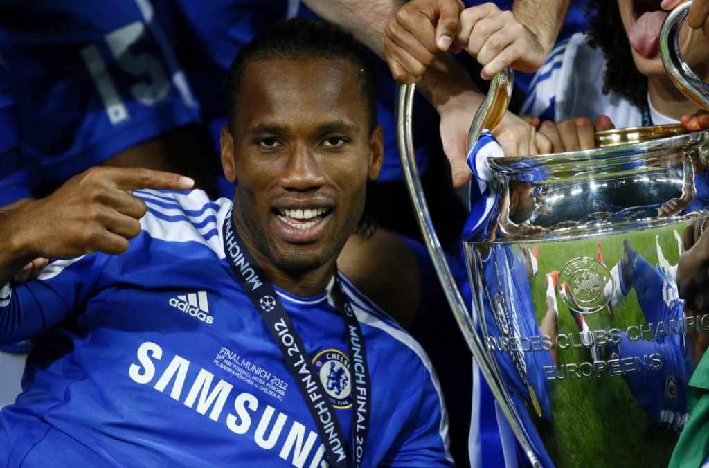 Chelsea's Drogba celebrates with the trophy after their Champions League final soccer match against Bayern Munich at the Allianz Arena in Munich